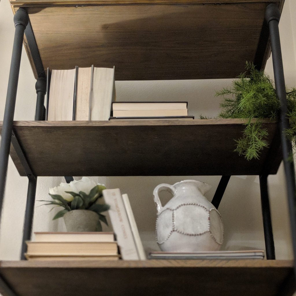how to style a bookshelf neutral tones