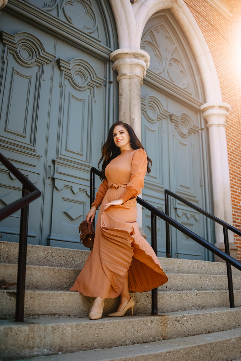 fall and winter 2022 color trends caramel pleated dress