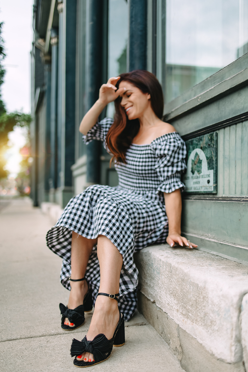 black pleated bow heel with gingham dress