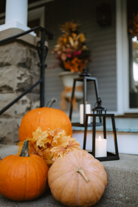 Thanksgiving porch decor with outdoor lanterns
